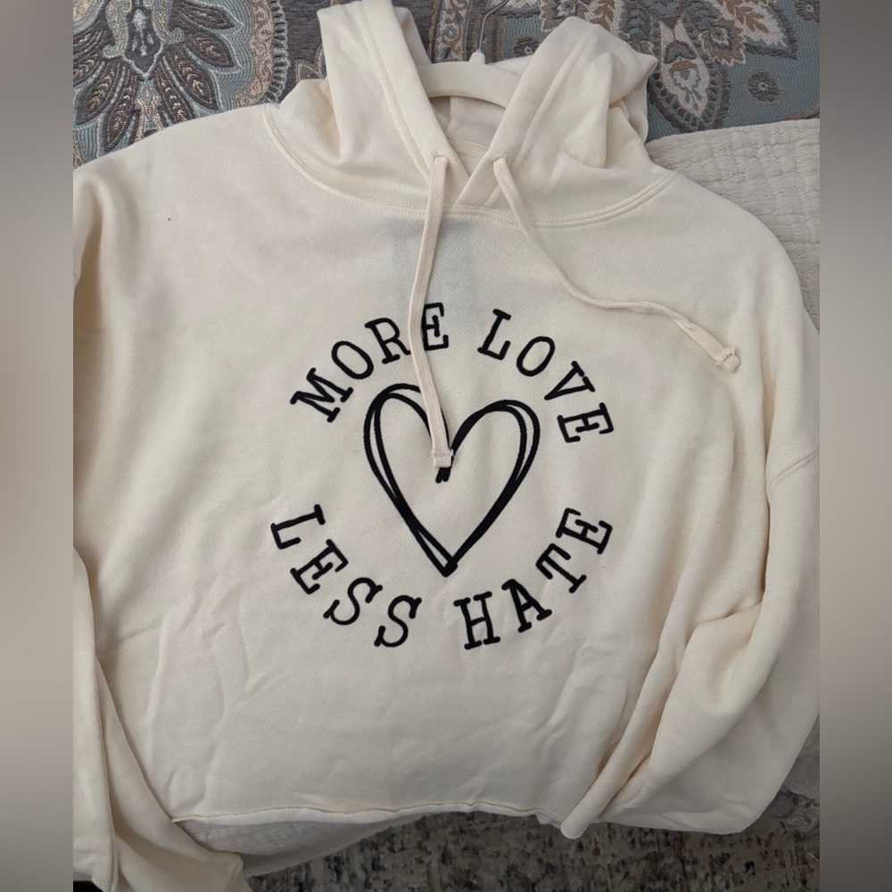 Women's Cream Hoodie with Heart Graphic
MORE LOVE LESS HATE